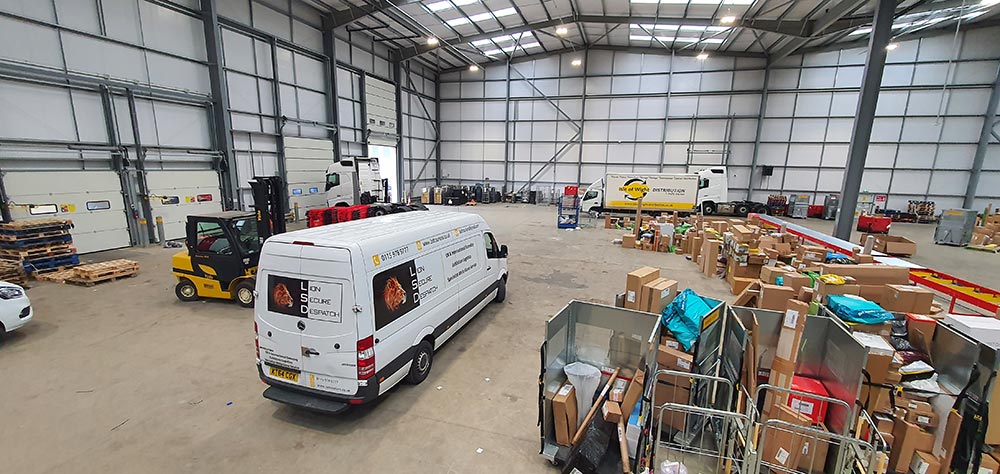 LSD courier loading a same-day delivery